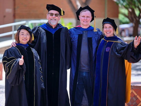 College of Information Science faculty in regalia