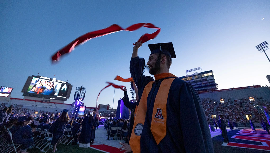 Graduating student at Commencement