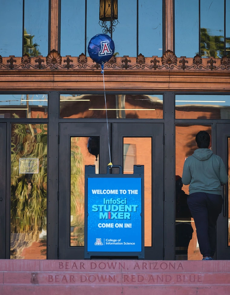 Bear Down Building with Infosci Student Mixer welcome sign