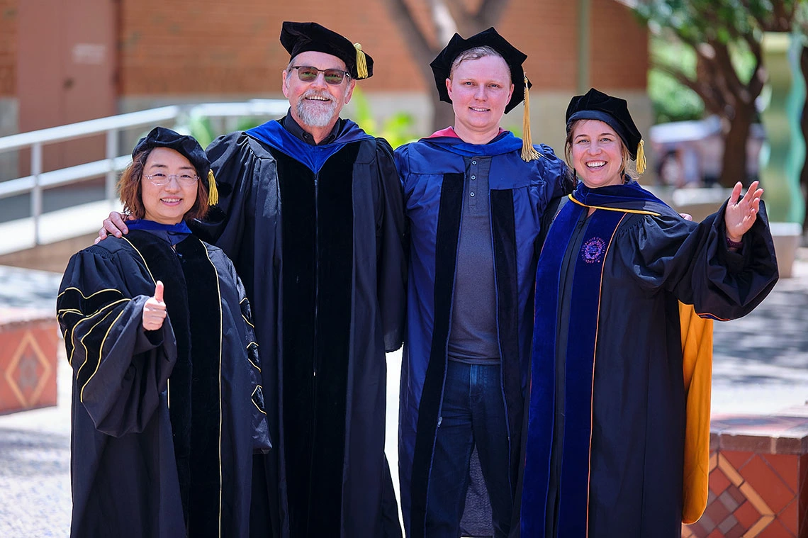 College of Information Science faculty in regalia