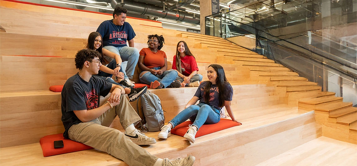 Students lounging on steps