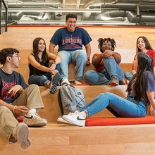 U of A students on library stairs