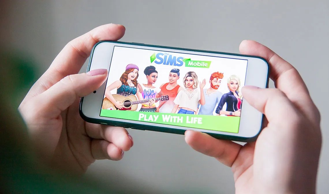 The Sims Mobile handheld game