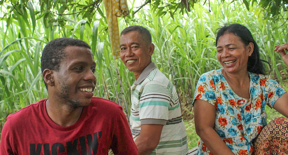 Bryan Armstrong with host family in Cambodia