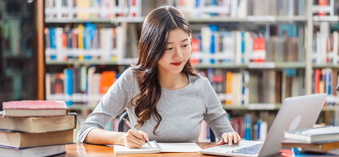 Student studying in library