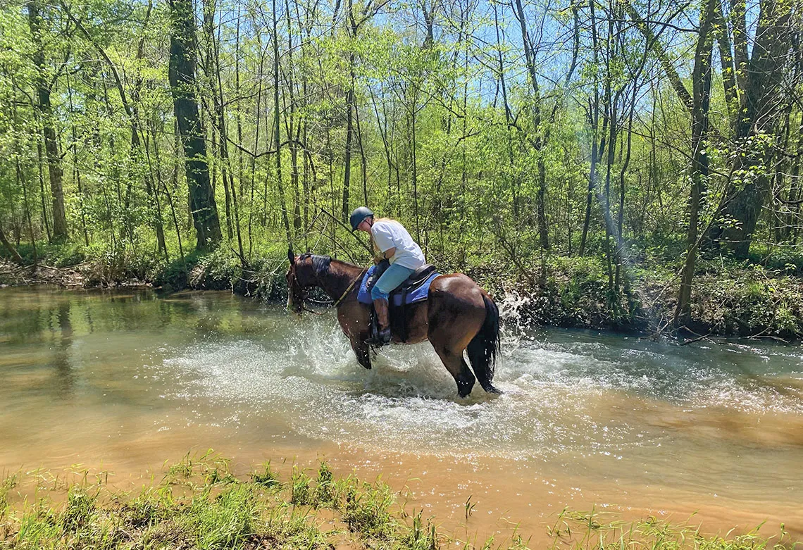 Meredith Parker rides a horse