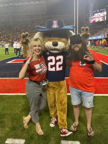 Danny Downes with Wilbur at football game