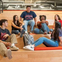 U of A students on library stairs