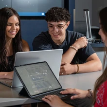 Students meeting with technology