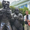 Michael McKisson with photographer statues in London